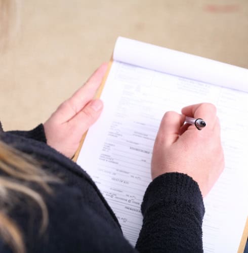 Patient completing a medical for